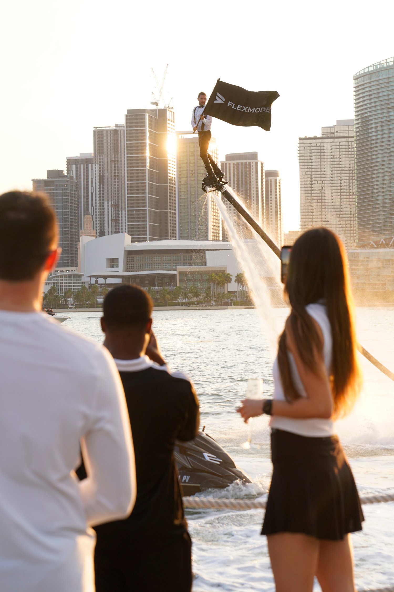 Flexmode member experience - flyboard with Flexmode flag over Miami water